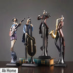 Jazz Band Musician Figurines Set of 4 – guitarist, double bassist, violinist and saxophonist resin sculptures in vintage finish