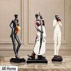 Jazz Trio Musician Figurines Set of 3 – saxophonist in grey, double bassist in burgundy, and trumpeter in white resin on black bases