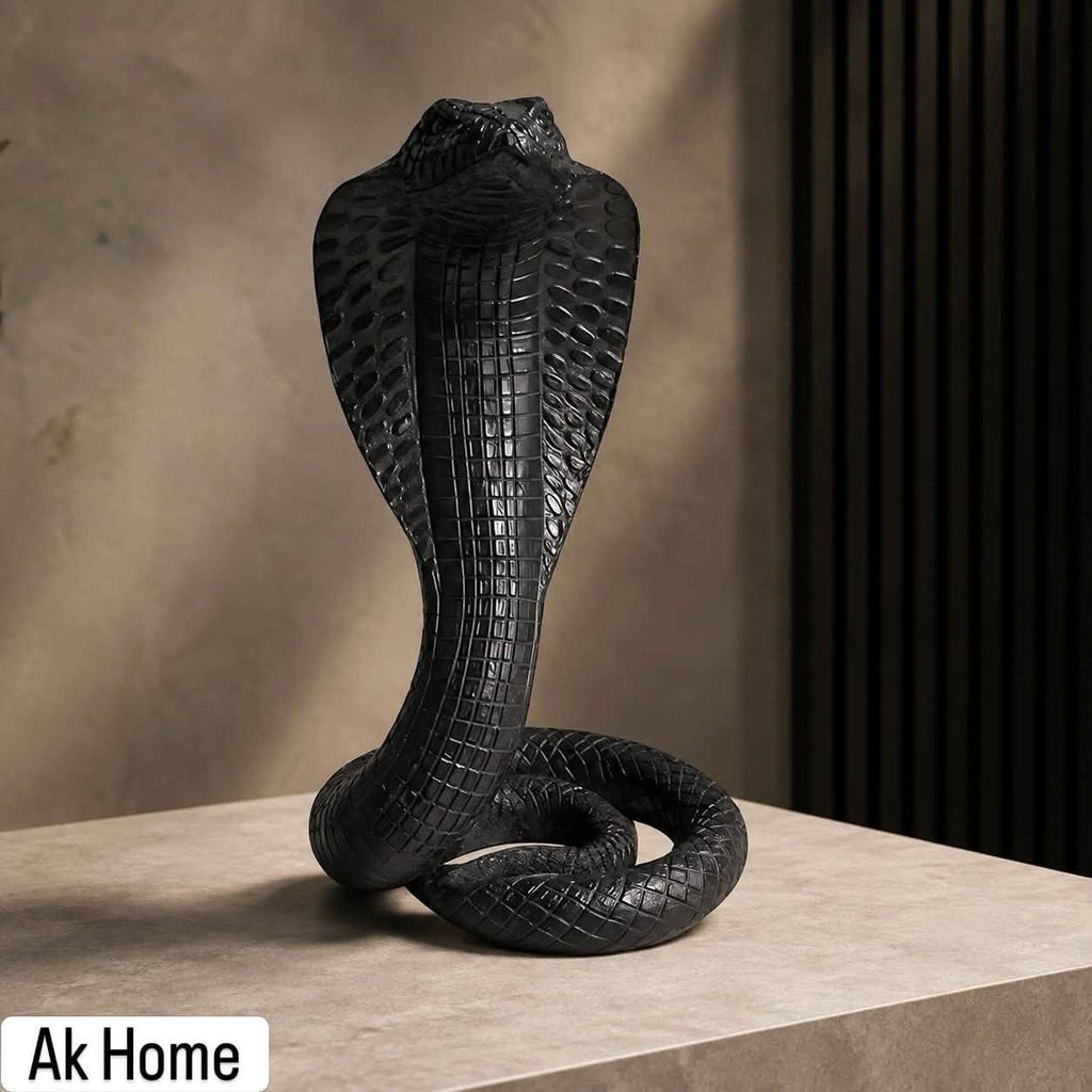 Cobra King Resin Sculpture – matte black hooded cobra figurine on stone surface