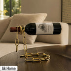 Gold Chain Wine Bottle Holder – gravity-defying metal chain rack in polished gold finish